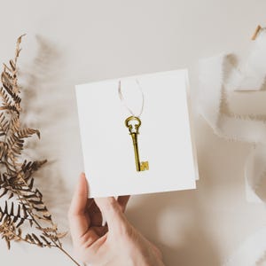 Tarjeta con llave dorada, tarjeta de felicitación navideña, regalo, interior en blanco, tarjeta cuadrada botánica, tarjetas de bellas artes
