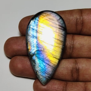 ¡Hermoso! Cabujón de labradorita púrpura brillante de calidad AAA++ en forma de pera de 52 × 28 × 7 mm y 93 ct. ¡Ideal para hacer joyas!