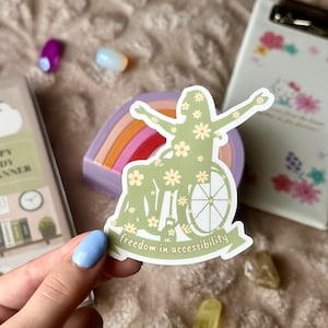 Freedom in accessibility wheelchair with flowers waterproof vinyl sticker laminated for bottles