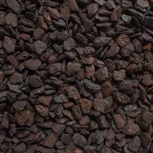 May include: A close-up shot of a pile of dark brown wood chips. The chips are of varying sizes and shapes, providing a natural, textured look. Suitable for garden landscaping and mulching.
