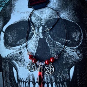Blood Vial Necklace with leather necklace.