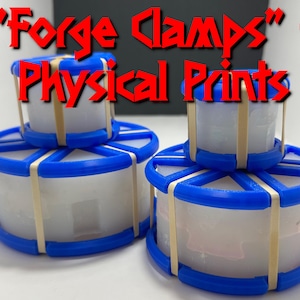May include: Two sets of 3D printed "Forge Clamps" in white with blue accents. Each set is stacked and secured with rubber bands.
