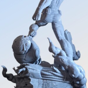 May include: A gray figurine depicting a muscular figure stepping onto a futuristic, mechanical structure. The figure is detailed with realistic textures and is posed in a dynamic action stance. The base features intricate mechanical components.