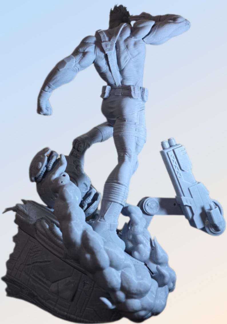 May include: A light gray action figure of a muscular character in a dynamic pose, with one arm raised. The figure is detailed with tactical gear and stands on a textured base with a futuristic weapon.