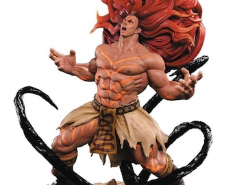 May include: A red and orange figurine of a muscular man with long, flowing red hair. The man is in a fighting pose with his arms raised and his mouth open in a yell. The figurine is standing on a brown base with black tendrils coming out of the base.