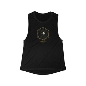 May include: Black sleeveless workout top with a gold geometric design featuring a bee and the text "Morphosis Threads Be in the Beauty Frequency". The top is made of a soft, breathable material.