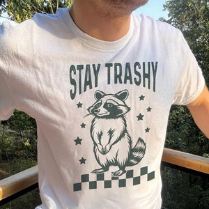 Stay Trashy Raccoon T-Shirt - Funny Checkered Graphic Tee, Unisex Casual Humor Shirt, Quirky Gift for Raccoon Lovers