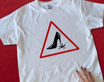 High Heel Warning T-Shirt – Feminist Humor Graphic Tee