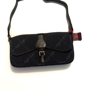 Chic Playboy Handbag - Carry Your Essentials in Style!