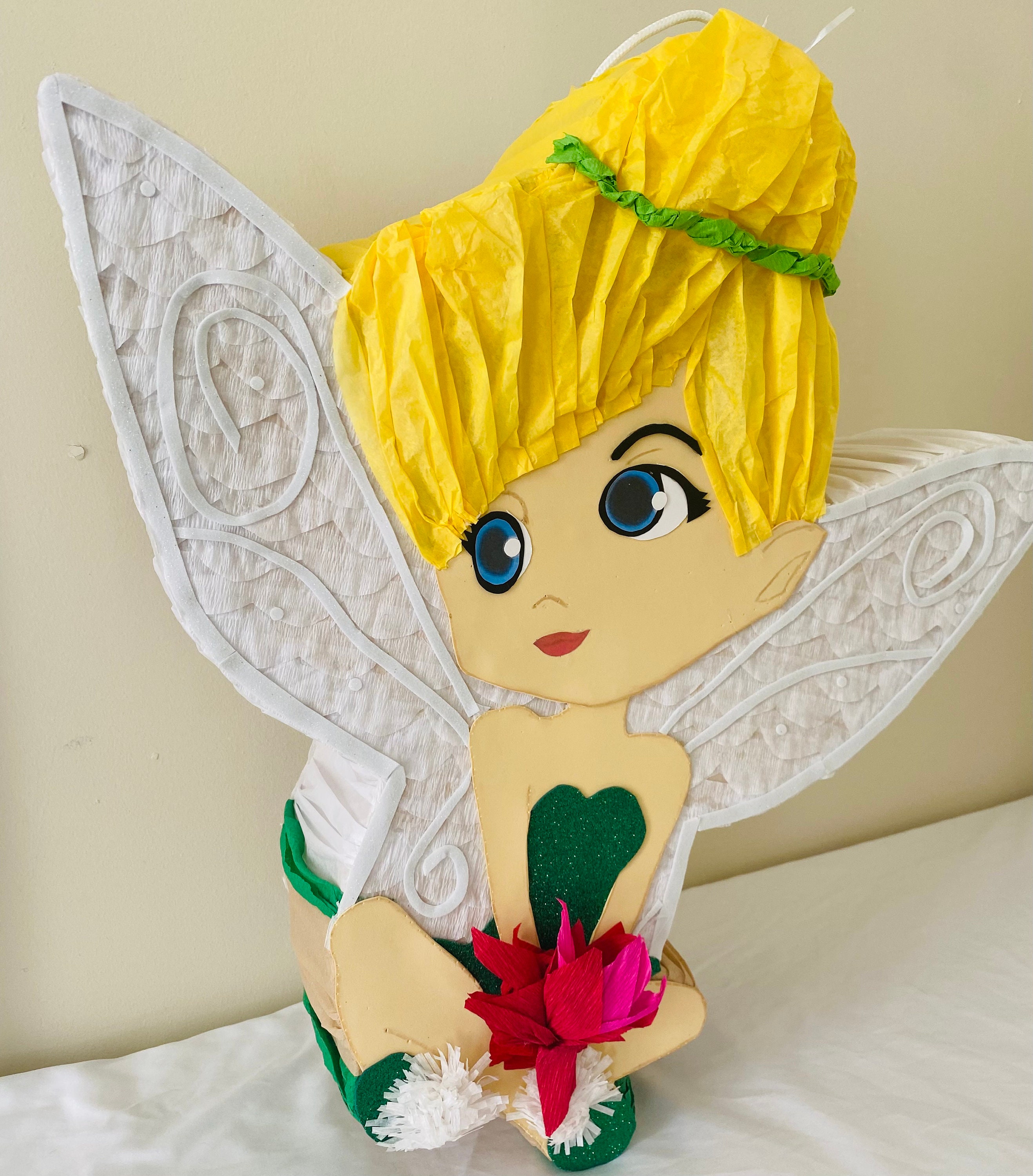 Tinkerbell Piata made with mostly recycled materials and tissue paper It is my pleasure to make beautiful Piatas for your