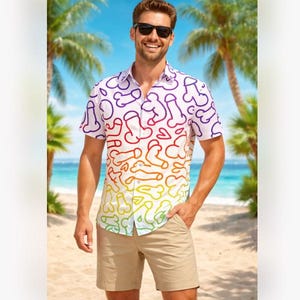 May include: A white button-down shirt with a rainbow penis pattern, paired with khaki shorts. The shirt's design transitions from purple to yellow, creating a vibrant gradient. The person is wearing sunglasses and standing on a beach.