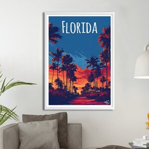 Peut inclure: Une affiche représentant un coucher de soleil avec des palmiers et une route qui s'étend à l'horizon. Le texte "FLORIDA" est en haut de l'affiche.
