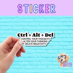 May include: A sticker with the text "Ctrl + Alt + Del" and the words "Control your thoughts, alter your thinking, delete negativity".