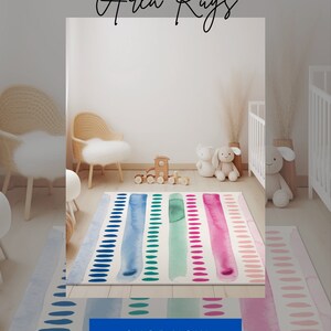 May include: A colorful area rug with watercolor stripes and polka dots in shades of blue, green, and pink. The rug is in a nursery with white walls and wooden furniture. The text "Adorable Kids Area Rugs" and "Shop Now" are visible in the image.