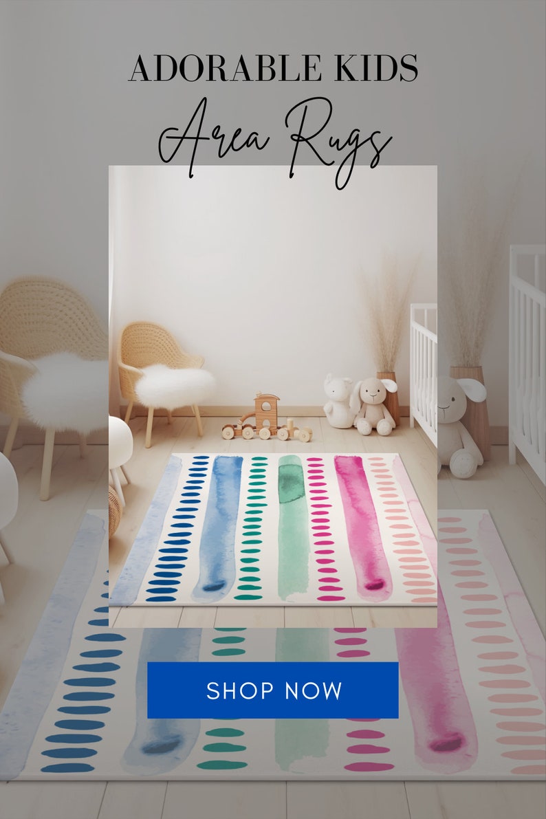 May include: A colorful area rug with watercolor stripes and polka dots in shades of blue, green, and pink. The rug is in a nursery with white walls and wooden furniture. The text "Adorable Kids Area Rugs" and "Shop Now" are visible in the image.