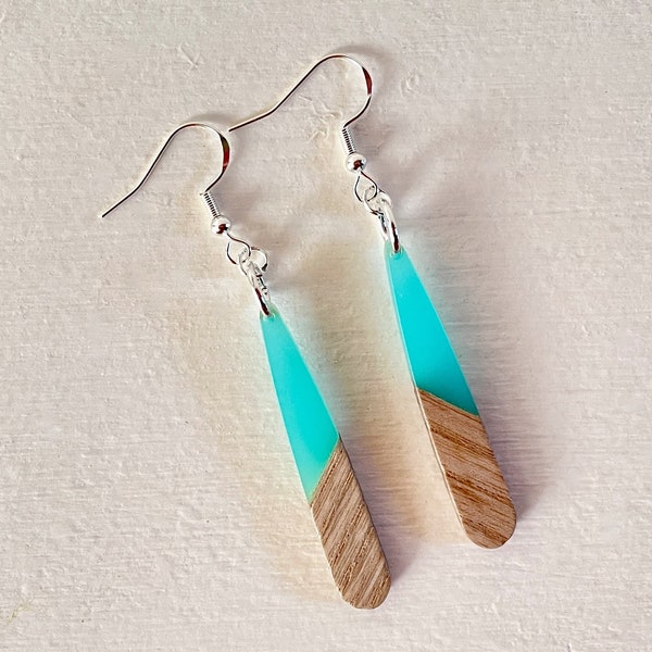 super cool bright turquoise resin and wood earrings