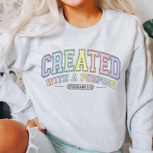 Created With A Purpose Sweatshirt Cute Ephesians 2:10 Bible Verse Crewneck Varsity-Inspired Trendy Christian Apparel Jesus Lover Friend Gift