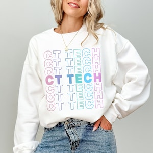 May include: White sweatshirt with the text "CT TECH" repeated in a rainbow pattern.