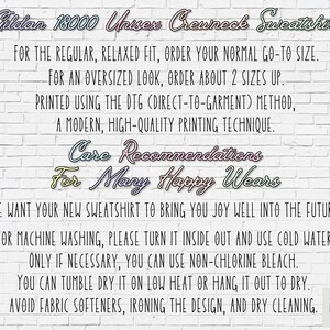 May include: White brick background with text that reads "Gildan 18000 Unisex Crewneck Sweatshirt".  The text below describes care instructions for the sweatshirt, including washing, drying, and ironing.