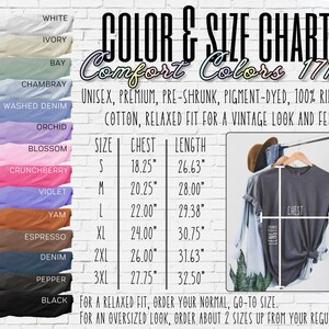 May include: A colour and size chart for Comfort Colors 1717 unisex t-shirts. The chart shows chest and length measurements in inches for sizes S to 3XL. Available colours include white, ivory, bay, chambray, washed denim, orchid, blossom, crunchberry, violet, yam, espresso, denim, pepper, and black.