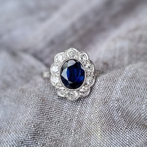 Charming 2.11 ct. Sapphire and Accents Diamonds Rosette Platinum Engagement Ring