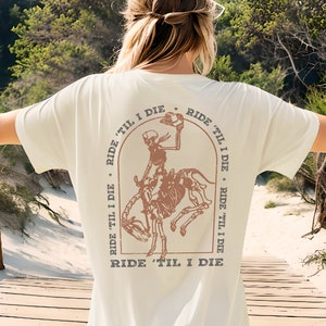 Horse Girl Tshirt, Ride Til I Die, Spooky Western Skeleton, Funny Womens T-Shirt, Gift for Horse Lover, Halloween Cowgirl Copper Tee Shirt