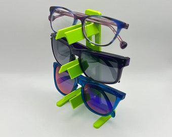 Sunglasses stand and eyewear organizer. Holds 2 or 3 pairs of sunglasses for kids and adults.