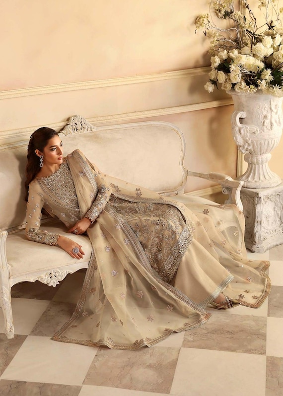 sachin and babi light blue dress What to Wear to an Indian Wedding as a Guest main image 0