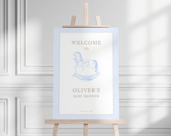 May include: A blue and white striped welcome sign with a rocking horse illustration and the text "Welcome to Oliver's Baby Shower".
