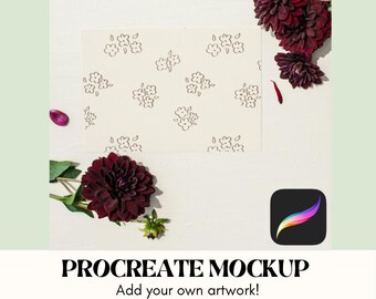May include: A Procreate mockup featuring a cream-colored paper with a floral pattern, surrounded by dark red dahlias and a Procreate app icon. The text reads "PROCREATE MOCKUP Add your own artwork! FOR PROCREATE ONLY."