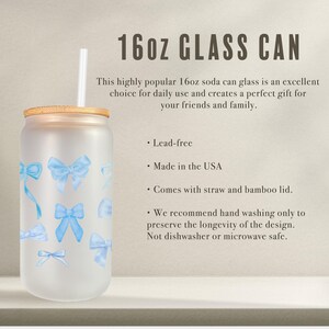 May include: A frosted glass 16oz soda can with a bamboo lid and a blue bow design. It comes with a straw and is lead-free.  The text on the image reads "16oz GLASS CAN".