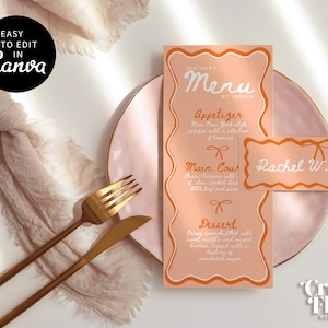 Może przedstawiać: Różowa i pomarańczowa karta menu urodzinowego z falistą ramką. Menu zawiera przystawki, danie główne i deser. Karta leży na różowym talerzu ze złotą obwódką. Na talerzu znajduje się karteczka z imieniem "Rachel W.". Na górze karty widnieje tekst "Menu urodzinowe autorstwa Jasmin."