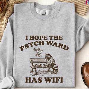 I Hope The Psych Ward Has Wifi Hoodie, Funny Raccoon Tee, Cozy Unisex Sweatshirt, Quirky Trash Panda Shirt, Meme Graphic Hoodie, Meme Shirt