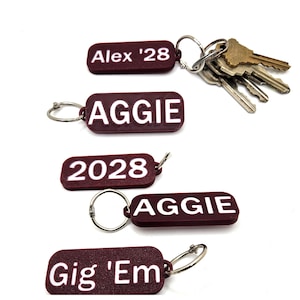 Texas A&M Nyckelring: Aggie / Gig 'Em eller personlig i rödbrunt och vitt