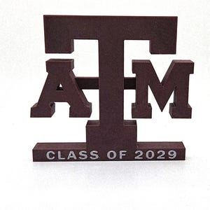 Texas A&M: Soportes con el logotipo de TAMU en bloque/Licencia CLC