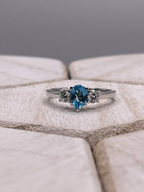 Beautiful Blue Topaz and Diamond Ring 14 kt. White