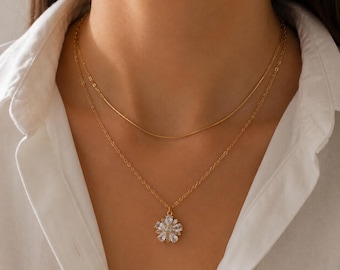 Gold layered necklace with crystal flower pendant – Double-layered gold necklace for women – Cubic zirconia flower necklace – Elegant jewelry for women