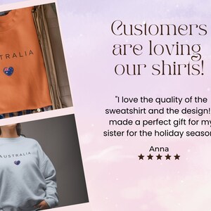 May include: Two photos of sweatshirts with the word "AUSTRALIA" and a small Australian flag heart design. A customer review reads "I love the quality of the sweatshirt and the design! It made a perfect gift for my sister for the holiday season!" - Anna