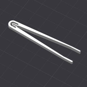 May include: A white, 3D-rendered pair of tongs. The tongs have a U-shaped handle and serrated tips. The background is a dark gray grid pattern.