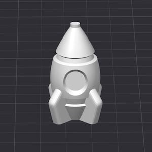 May include: A 3D-rendered, white rocket ship model. The rocket has a cylindrical body with a circular window, a conical top, and three fins at the base. The model is set against a dark gray grid background.