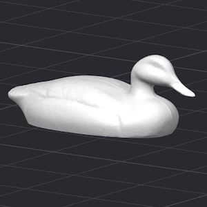 May include: A white ceramic duck decoy. The duck is in a resting position with its head turned to the side.