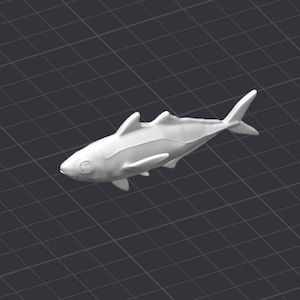May include: A white plastic toy fish with a fin on its back and a tail fin. The fish has a slightly open mouth and a black eye.