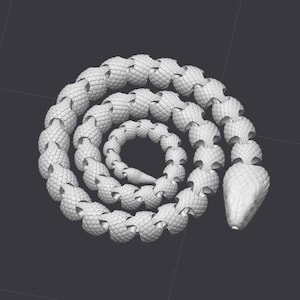 May include: A white, segmented, snake-like sculpture coiled in a circle. The sculpture is made of individual, rounded pieces that resemble scales.