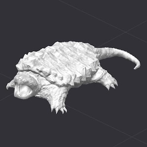 May include: A white 3D printed model of an alligator snapping turtle with its mouth open. The turtle has a rough, textured shell and a long, thin tail.