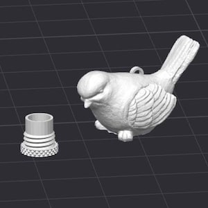 以下が含まれることがあります： 詳細な翼と尾羽を備えた、白の3Dプリントされた鳥の装飾品。テクスチャード加工されたベースを備えた小さな円筒形の部品が近くにあります。鳥には吊り下げ用のループが付いています。暗いグリッドの背景にあります。