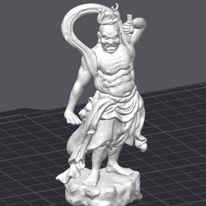 May include: A white statue of a muscular figure holding a sword, with a flowing cloth behind the head. The figure stands on a rocky base, with an angry expression. The statue is set against a dark gray background.