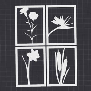 May include: Four white floral designs in rectangular frames. The images include a carnation, a bird of paradise flower, a daffodil, and cattails. The designs are set against a dark gray background.