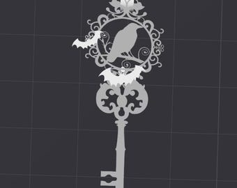 May include: A decorative key-shaped ornament with a raven perched on a branch within a circular frame. Two bats flank the frame. The key is silver-colored and has a gothic design, suitable for Halloween or gothic decor.