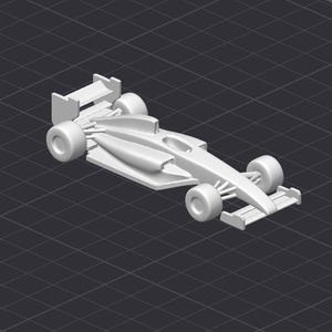 May include: A white model of a race car with a large rear wing. The car has a detailed design with visible wheels and a spoiler.