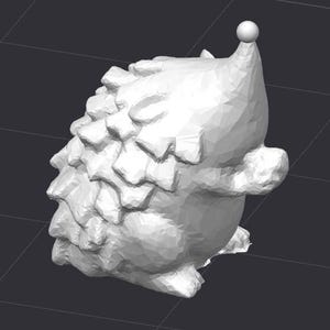 May include: A white, 3D printed model of a hedgehog with a small, round, white ball on top of its head. The hedgehog is posed in a sitting position with its head tilted to the side.
